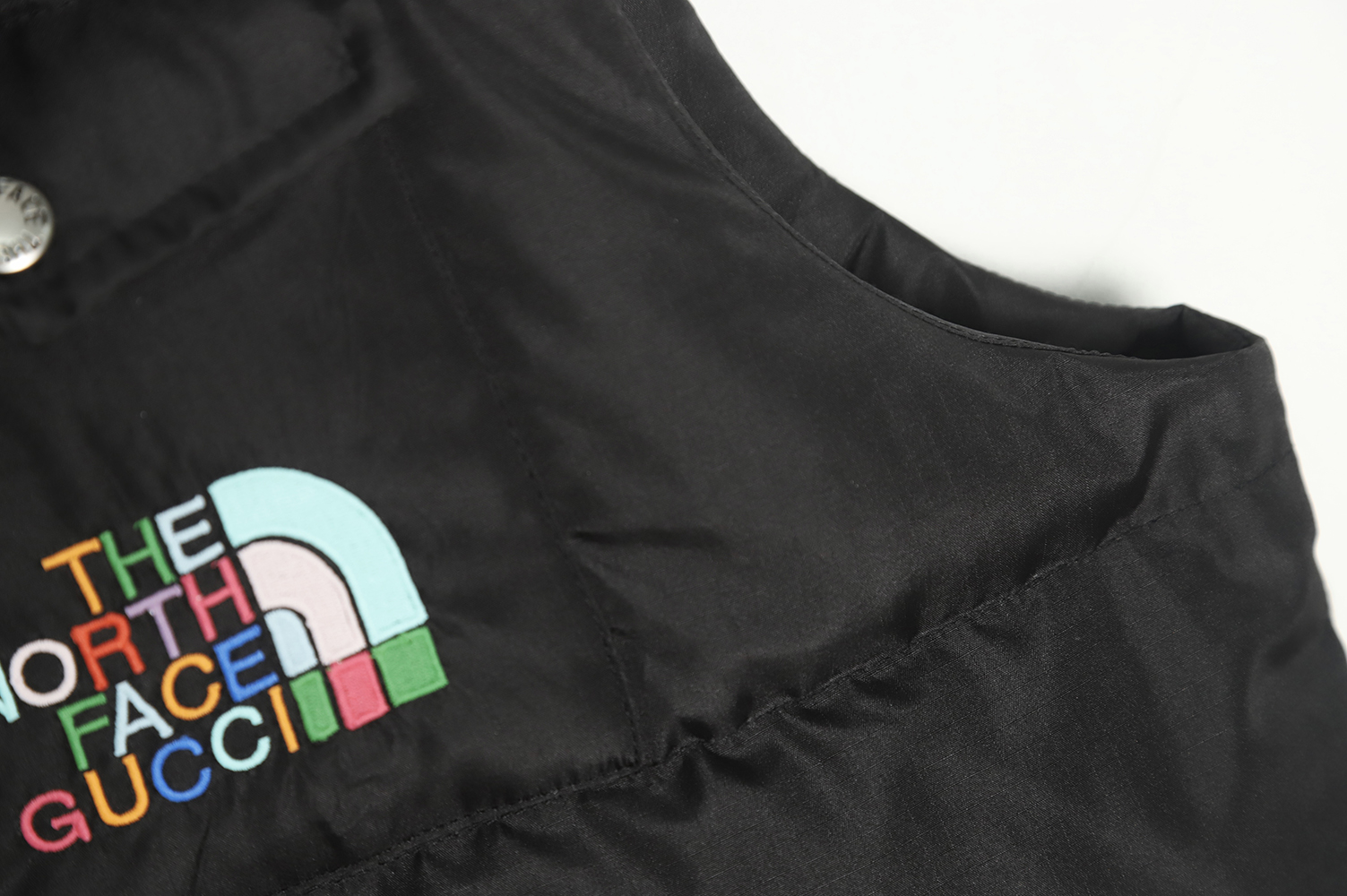 the nor*h f**e x G*u*i joint stand collar down vest tsk1