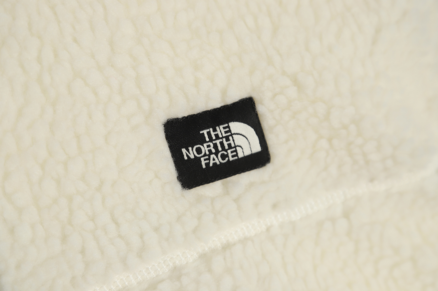 the nor*h F**e fw21 down jacket with stand collar on both sides tsk2