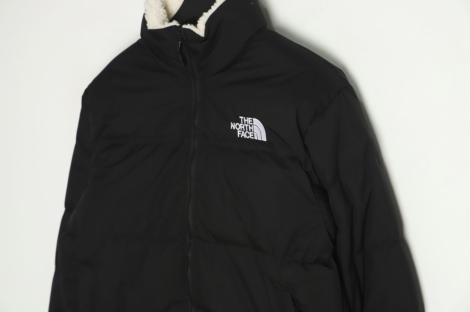 the nor*h F**e fw21 down jacket with stand collar on both sides tsk2