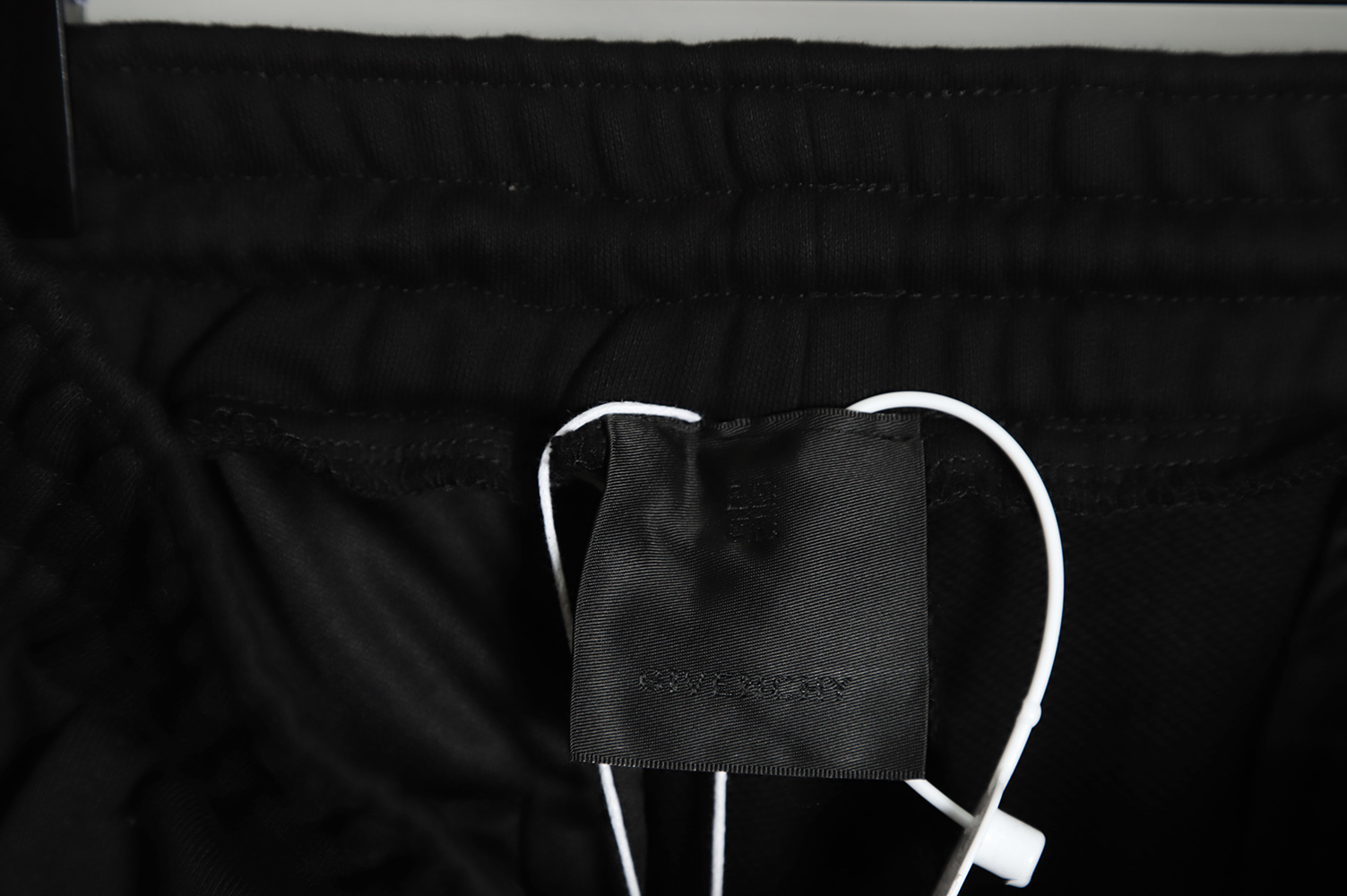 Givenchy four grid embroidery logo shorts