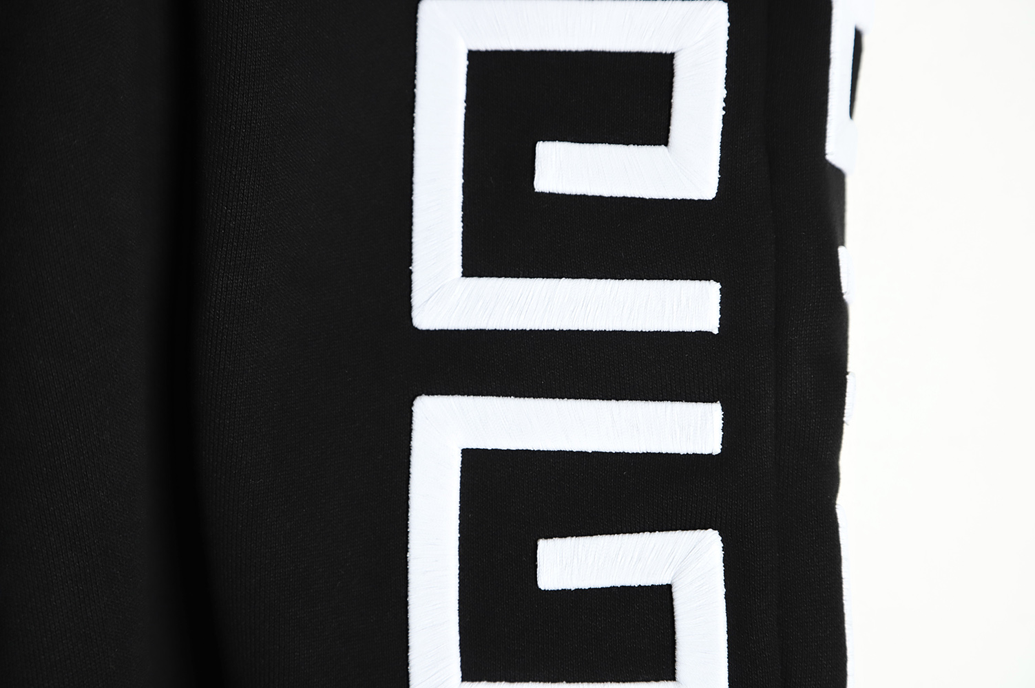 Givenchy four grid embroidery logo shorts