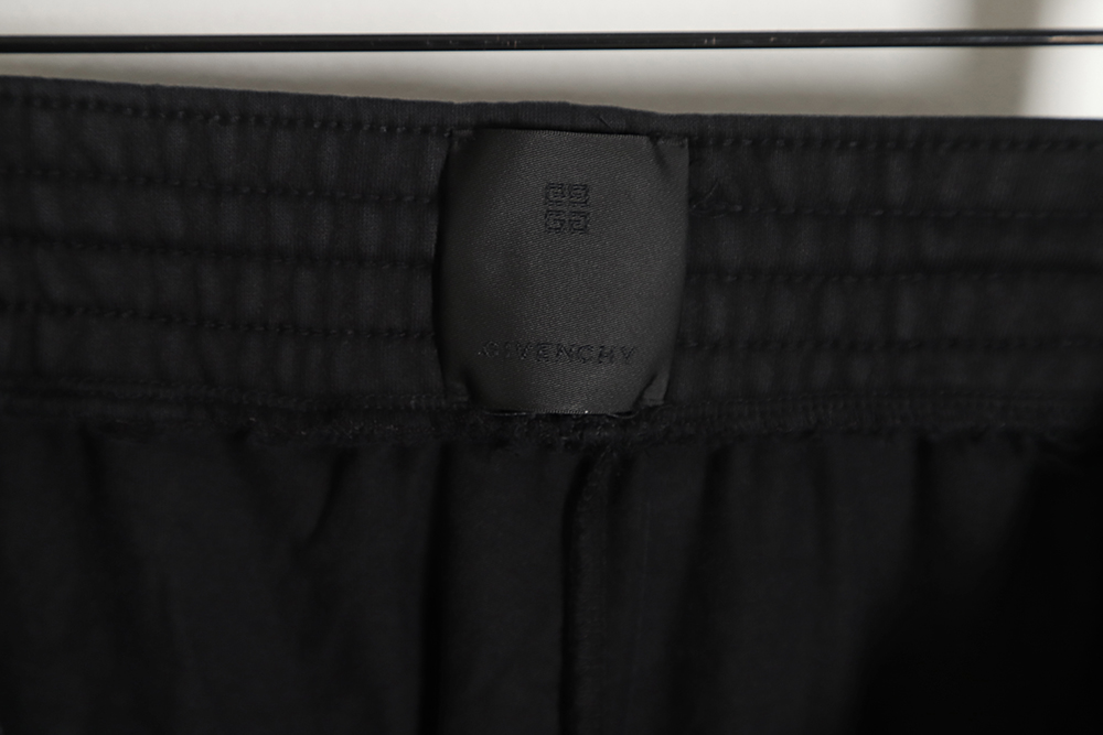 Givenchy 23SS ripped print fake two-piece shorts