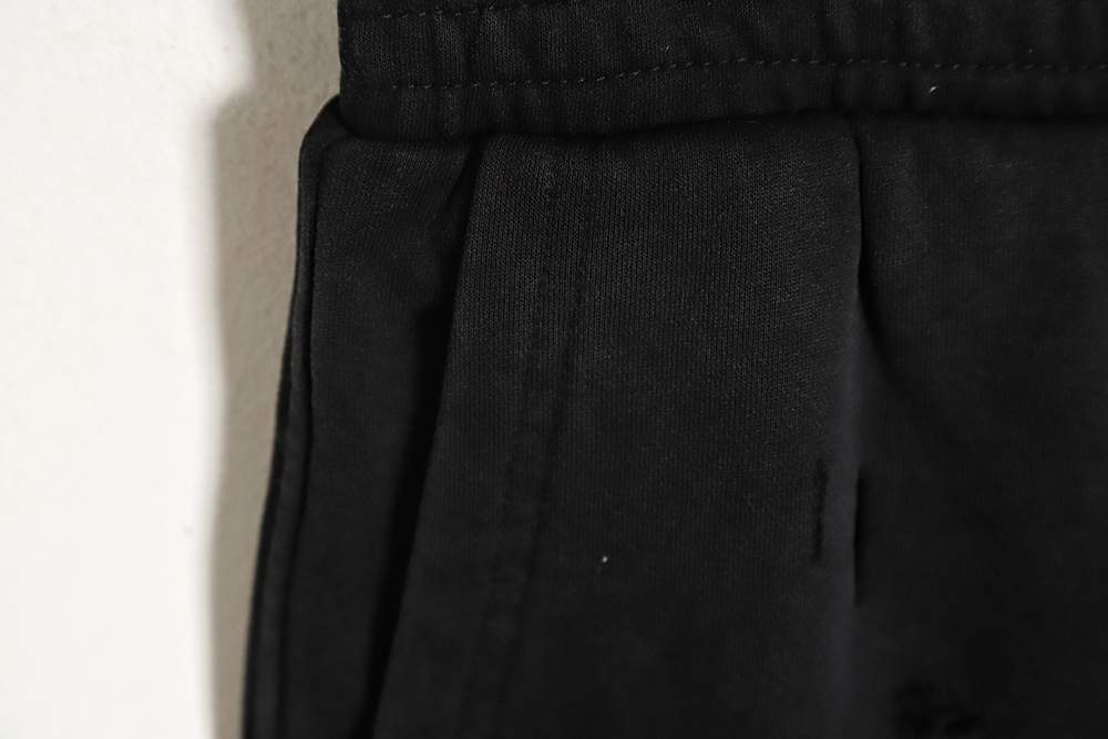 Givenchy 23SS ripped print fake two-piece shorts