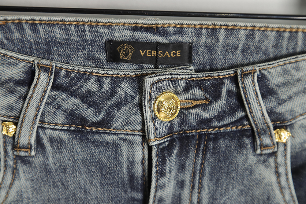 Versace back portrait embroidered denim trousers