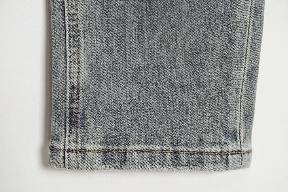 Versace back portrait embroidered denim trousers