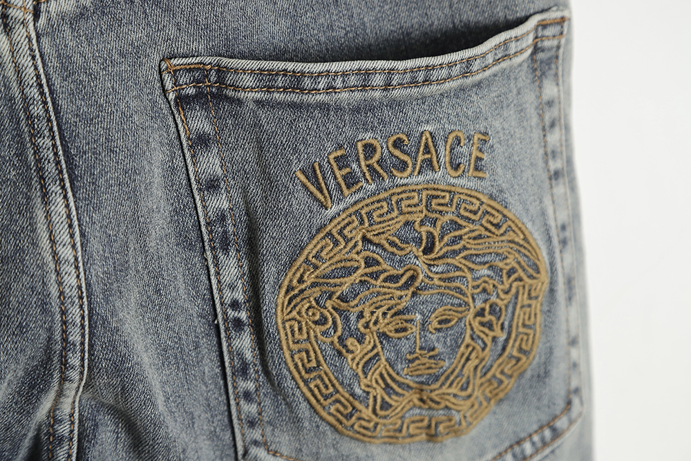Versace back portrait embroidered denim trousers