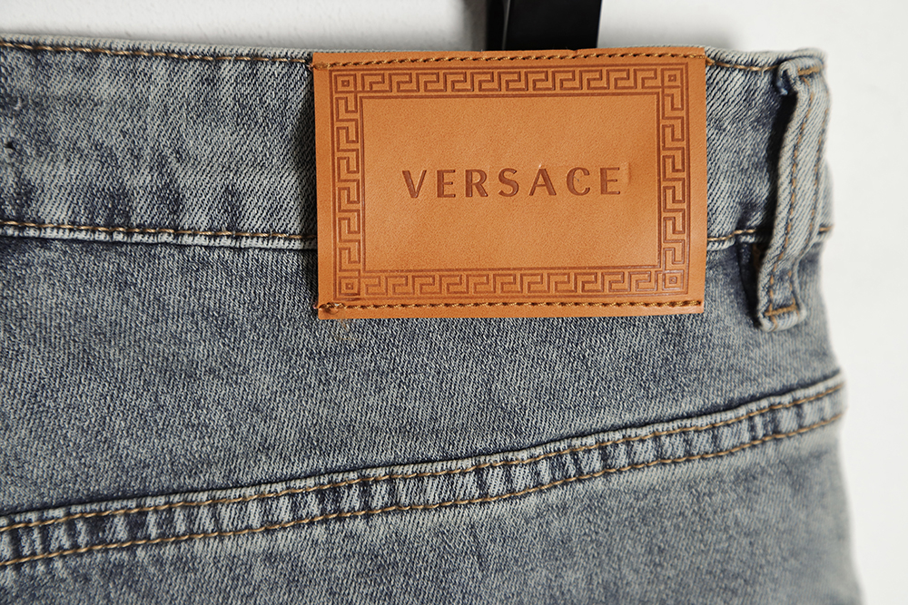 Versace back portrait embroidered denim trousers