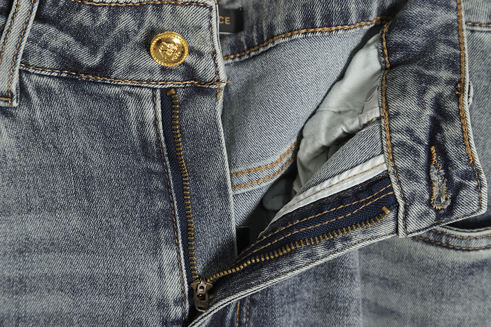 Versace back portrait embroidered denim trousers