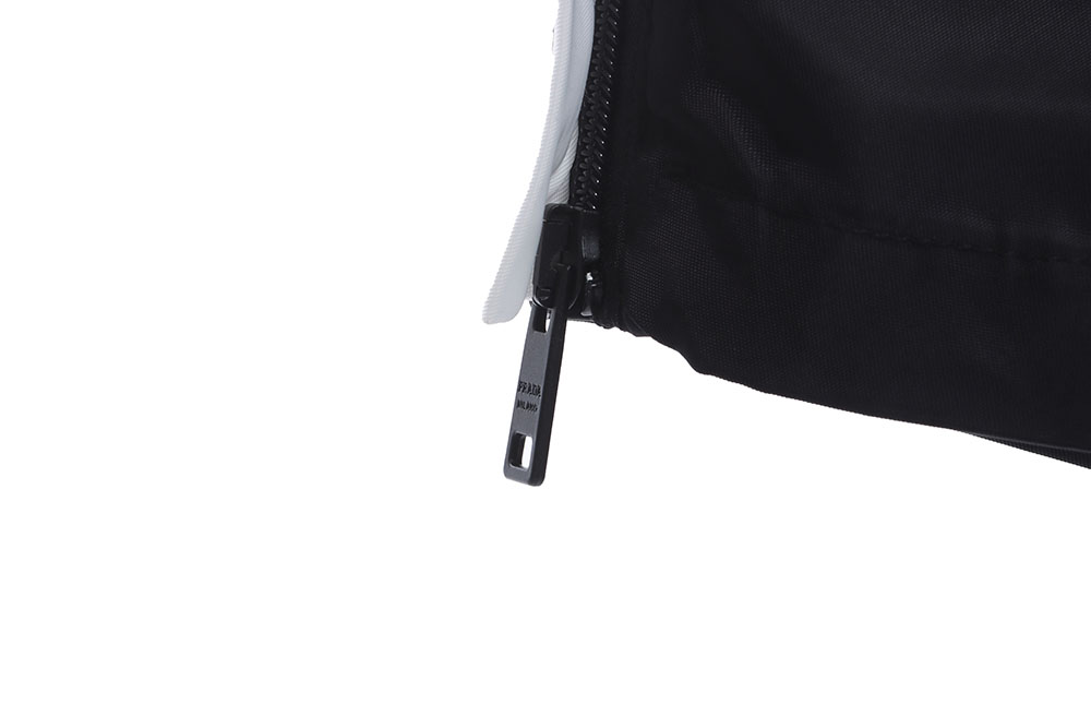 Pra*a color-block nylon double-zip trousers