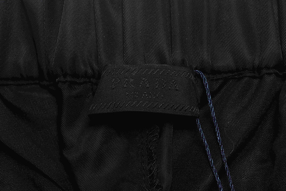 Pra*a color-block nylon double-zip trousers