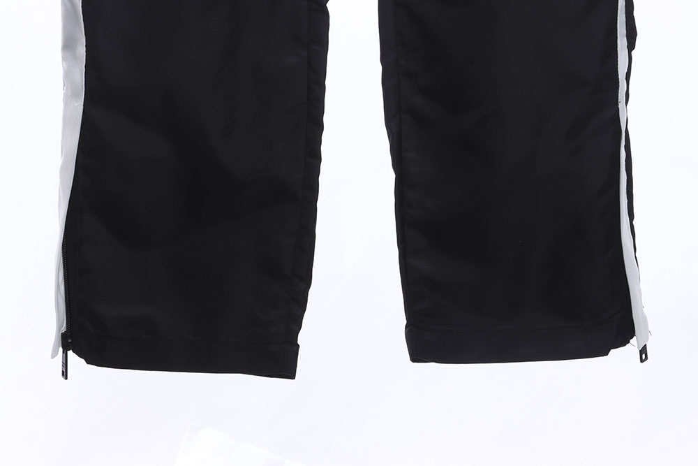 Pra*a color-block nylon double-zip trousers