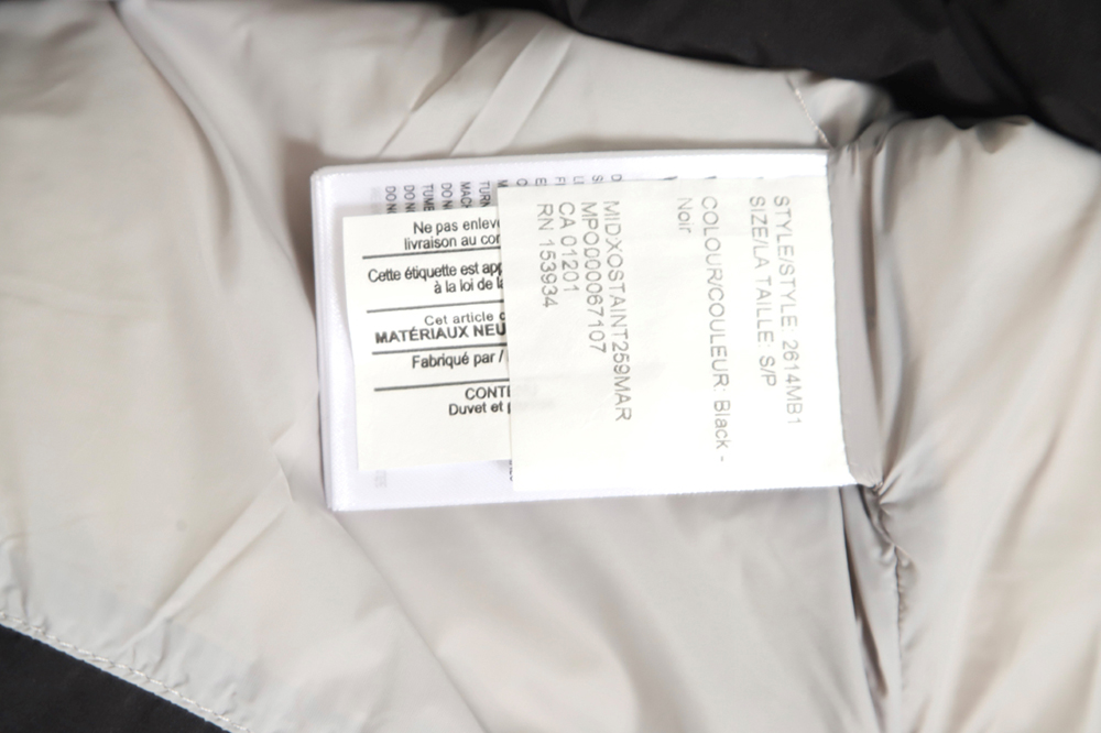 Can*a Go*e everett capsule white label down vest