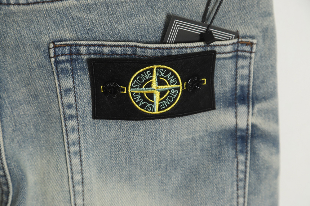 Stone island back logo denim trousers