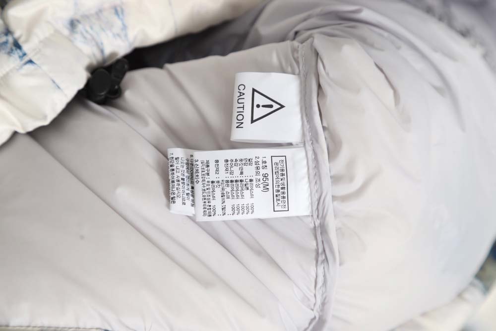 the nor*h f**e t*f nor*h f**e nuptse 1996 large plaid earth print down jacket