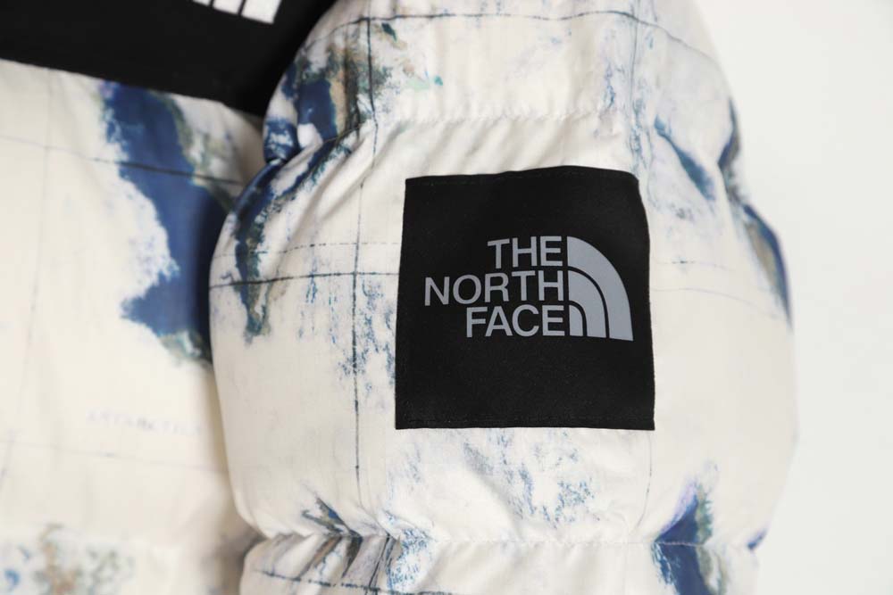 the nor*h f**e t*f nor*h f**e nuptse 1996 large plaid earth print down jacket