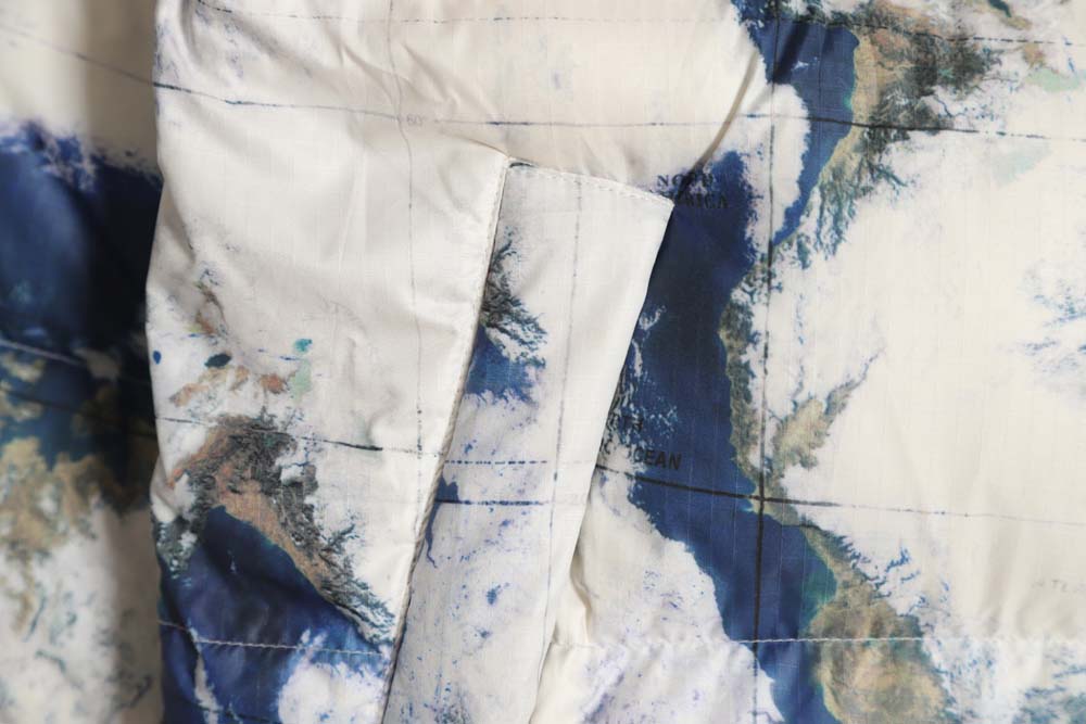 the nor*h f**e t*f nor*h f**e nuptse 1996 large plaid earth print down jacket