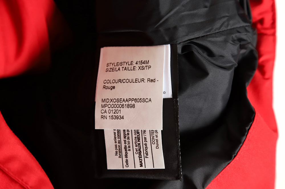 Can*a Go*e crew vest