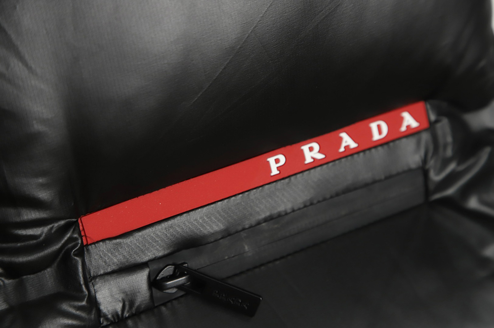 Pra*a red stripe logo down vest