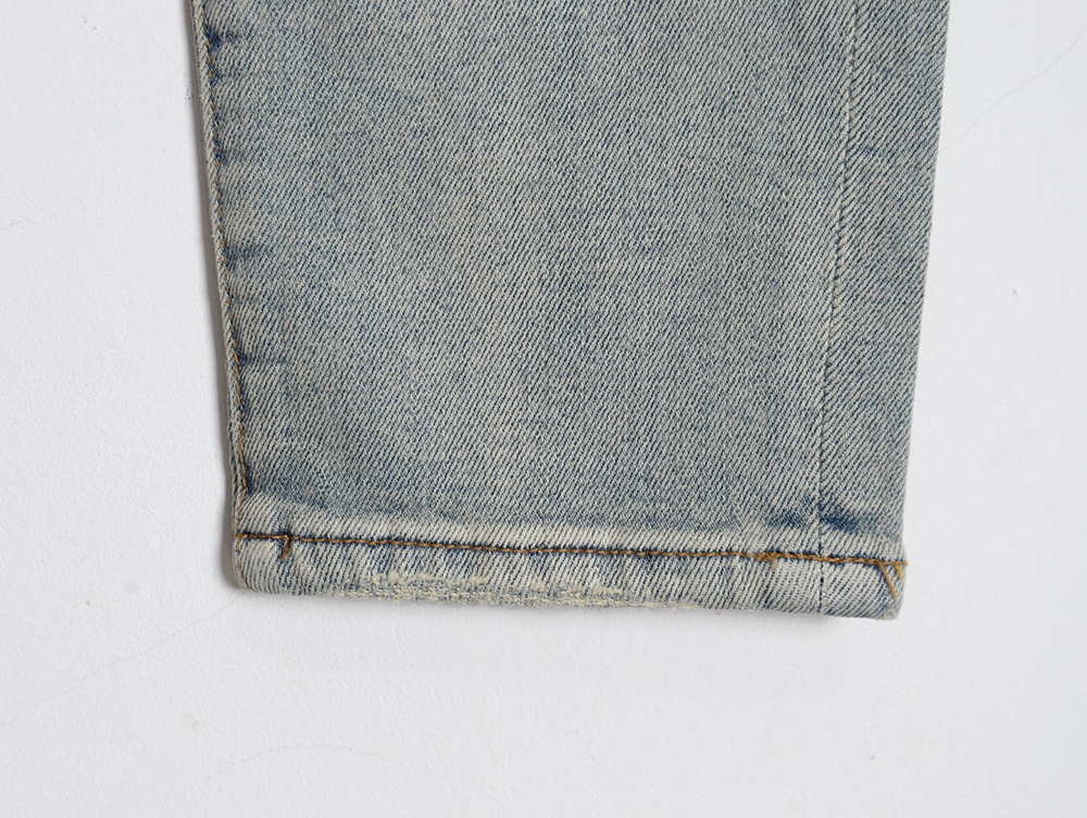 L0ew* glitch style embroidered logo jeans