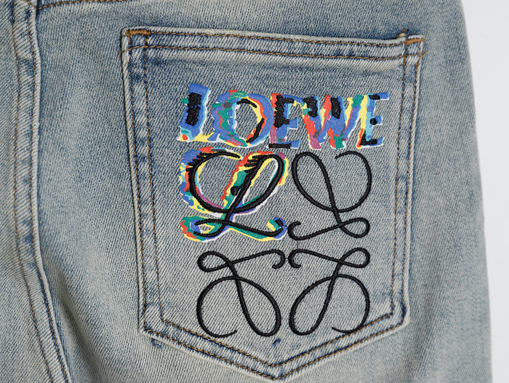 L0ew* glitch style embroidered logo jeans