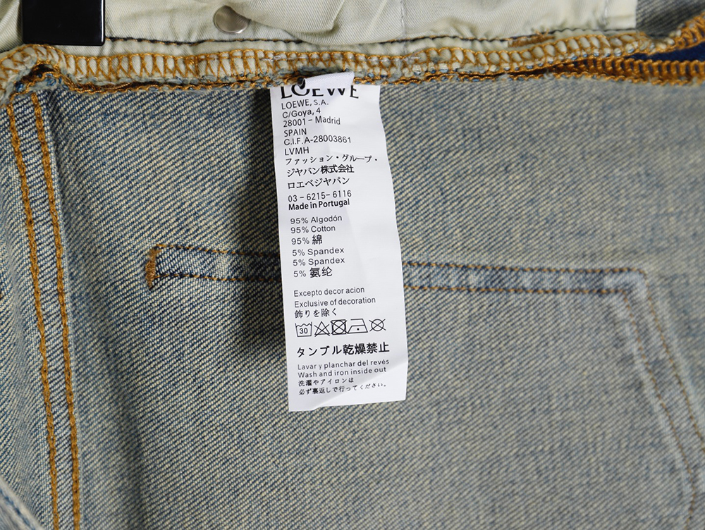 L0ew* glitch style embroidered logo jeans