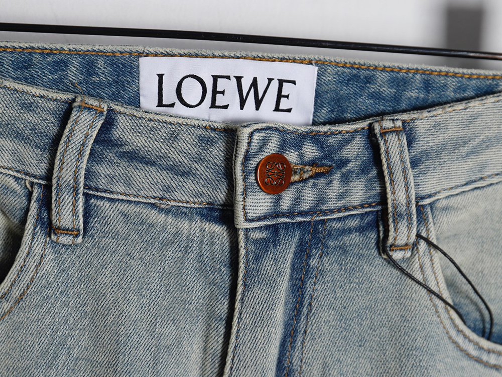 L0ew* glitch style embroidered logo jeans