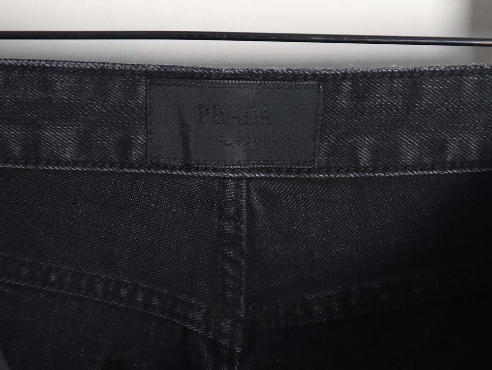 Pra*a 23fw triangle logo and logo embroidered washed jeans