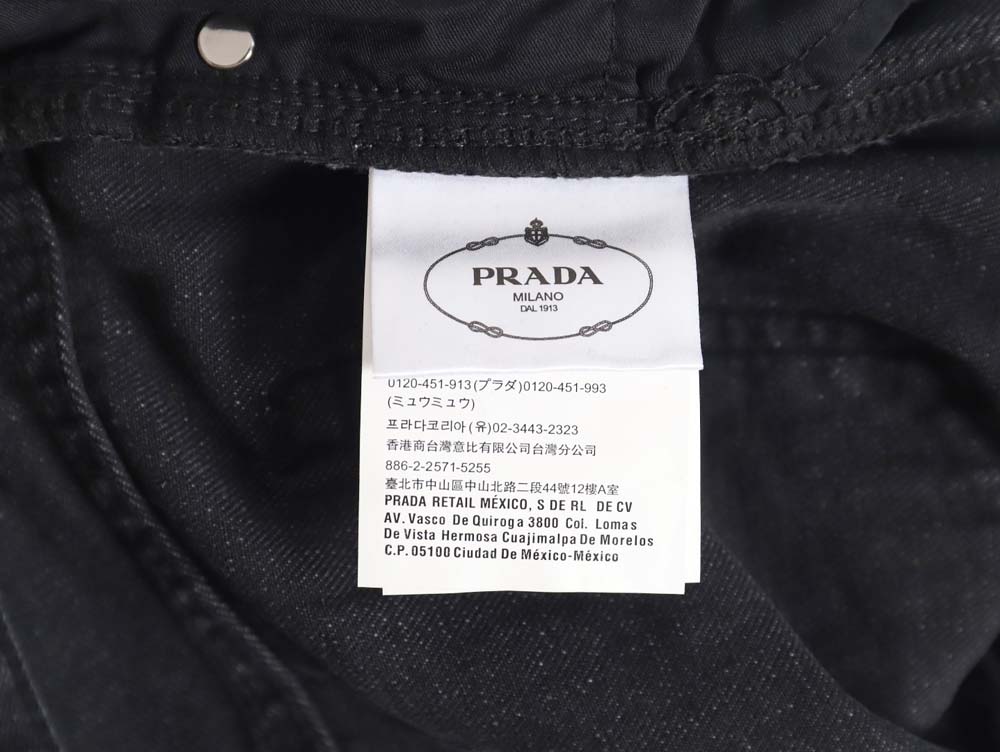 Pra*a 23fw triangle logo and logo embroidered washed jeans