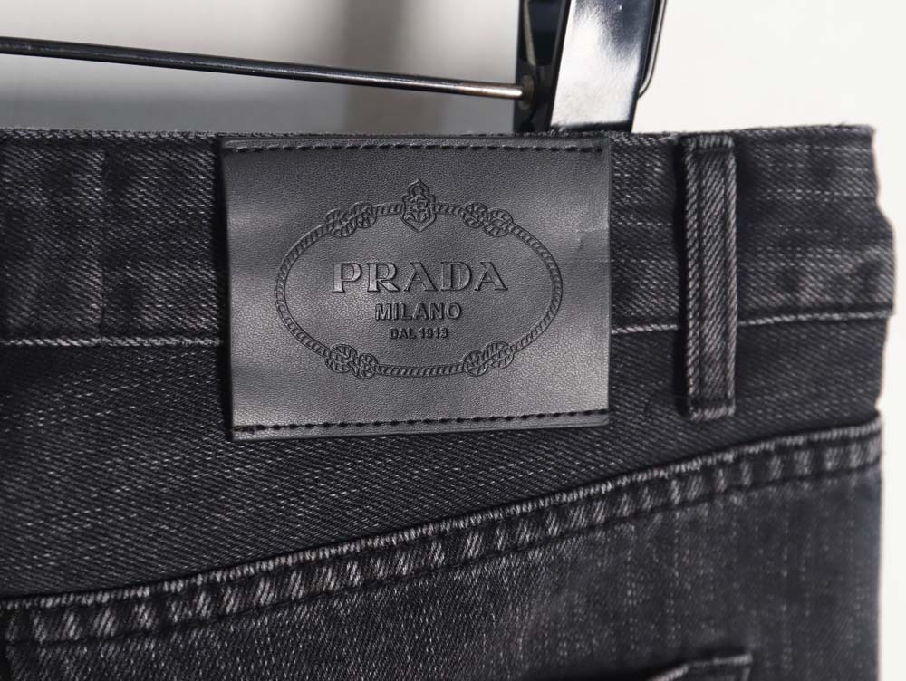 Pra*a 23fw triangle logo and logo embroidered washed jeans