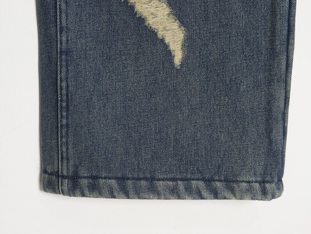 Ba*len*cia*ga double b embossed lightning wash distressed jeans