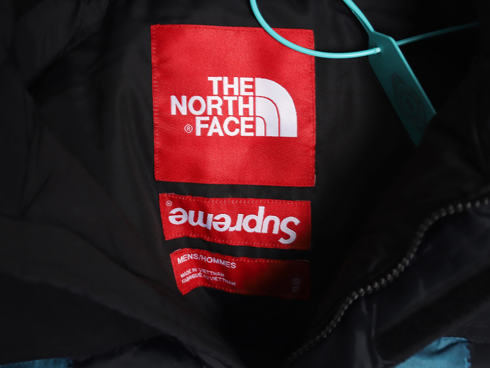 the nor*h f**e x S*p*e joint statue of liberty down jacket