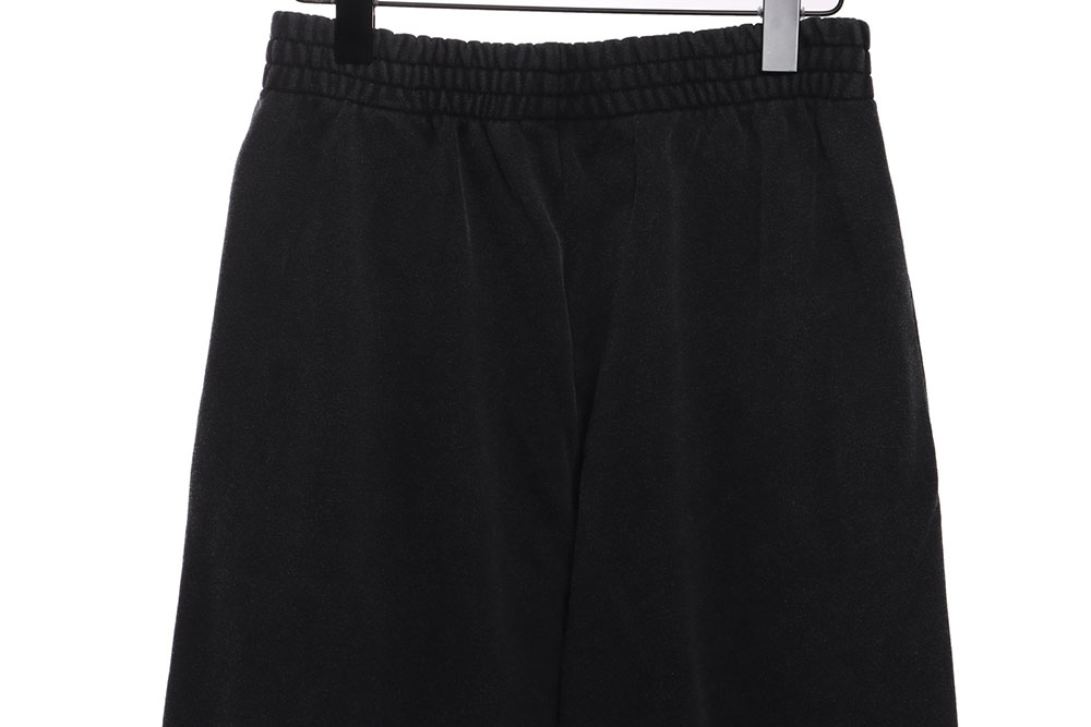 Ba*len*cia*ga distressed washed monogram trousers