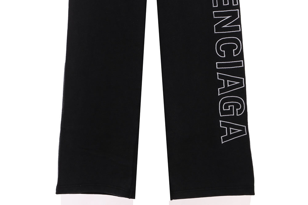 Ba*len*cia*ga distressed washed monogram trousers