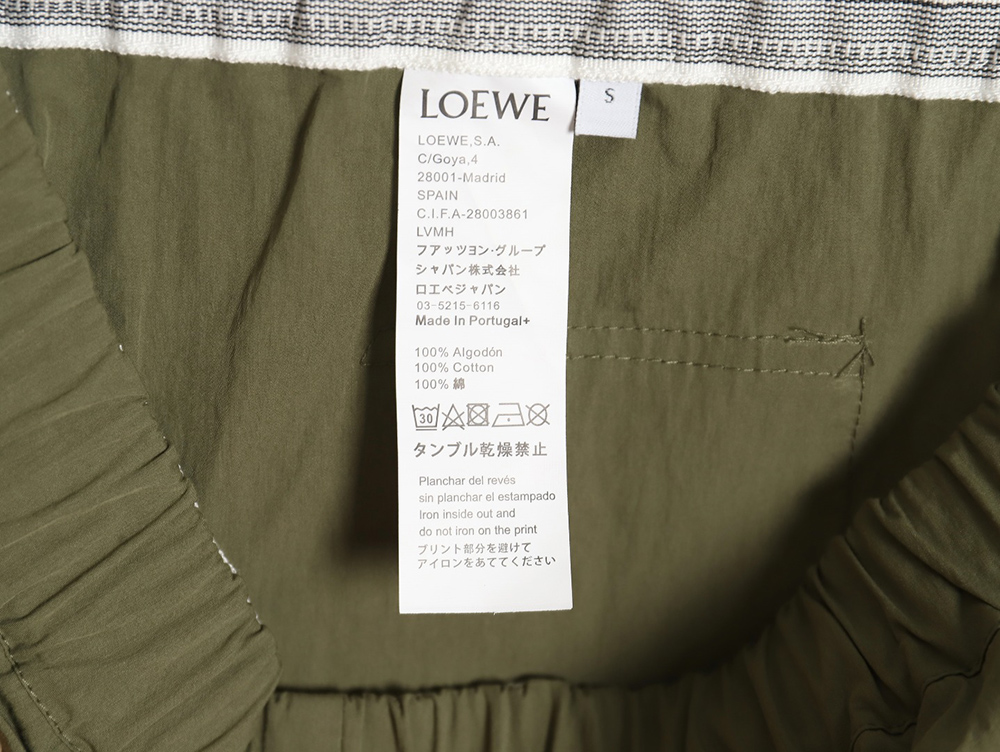 L0ew* olive green cotton blend shorts with embroidered pockets