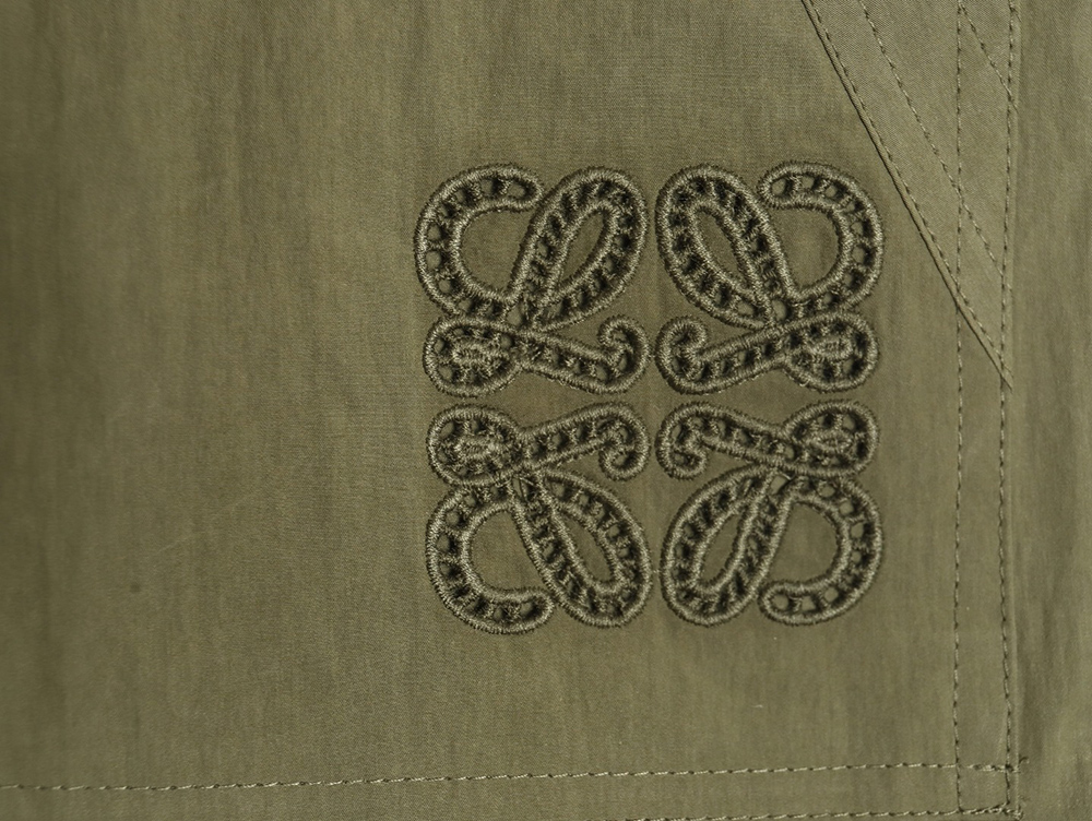 L0ew* olive green cotton blend shorts with embroidered pockets