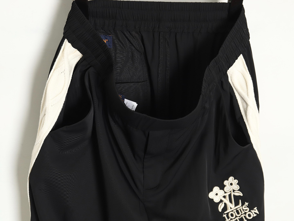 l0*is V*t0n x tyler logo floral embroidered trousers