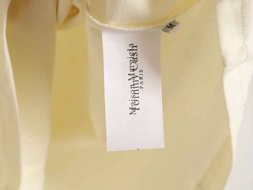 ma*s*n Ma*i*la & tommy cash joint mosaic alphanumeric short sleeve