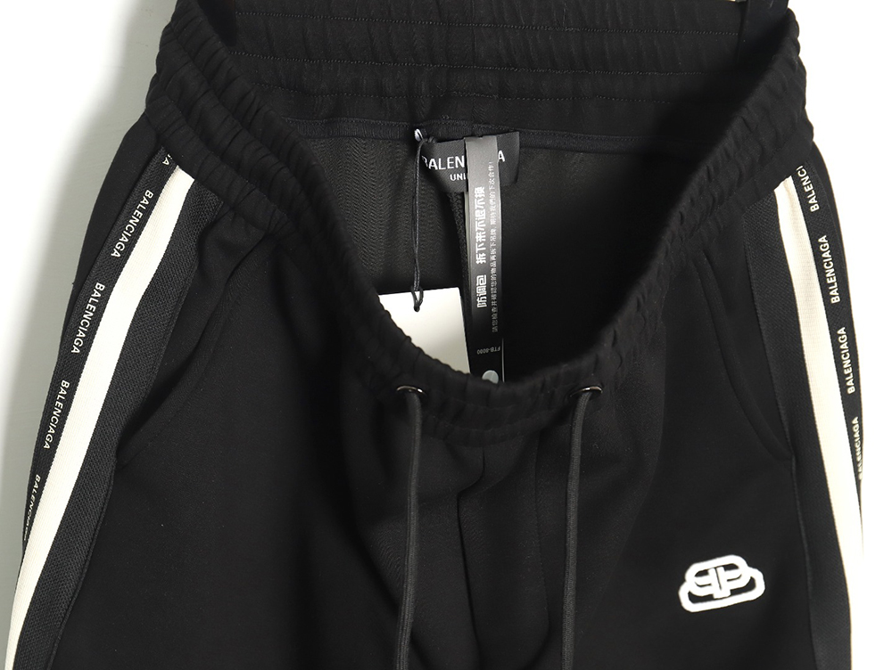 Ba*len*cia*ga lock embroidered web trousers