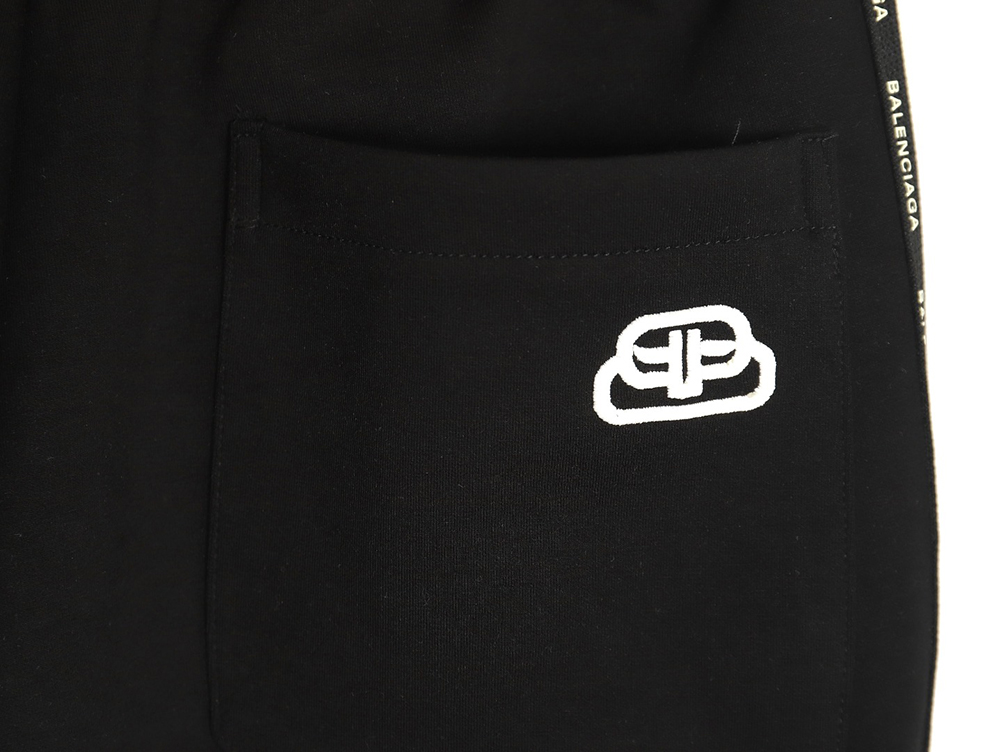 Ba*len*cia*ga lock embroidered web trousers