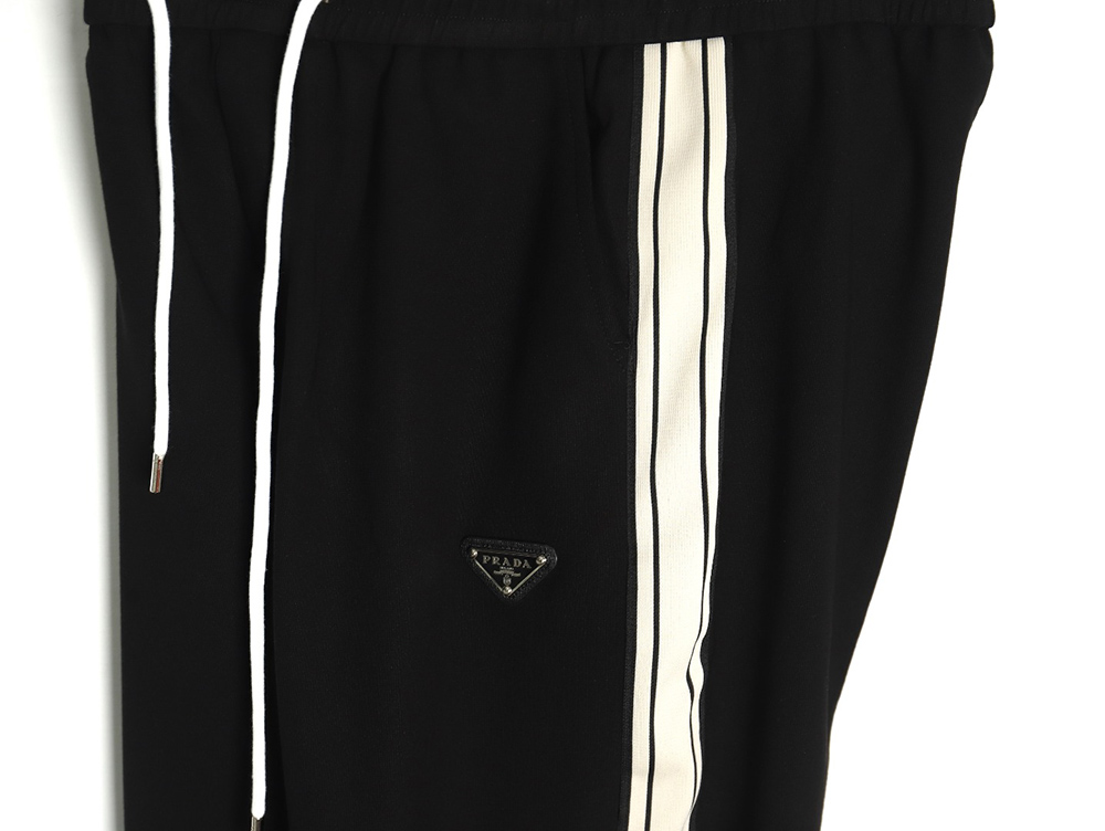 Pra*a triangle logo iron ribbon trousers