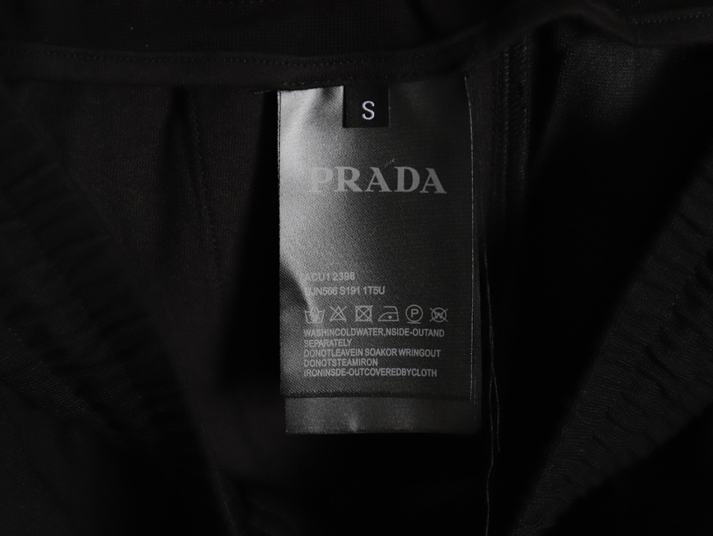 Pra*a triangle logo iron ribbon trousers