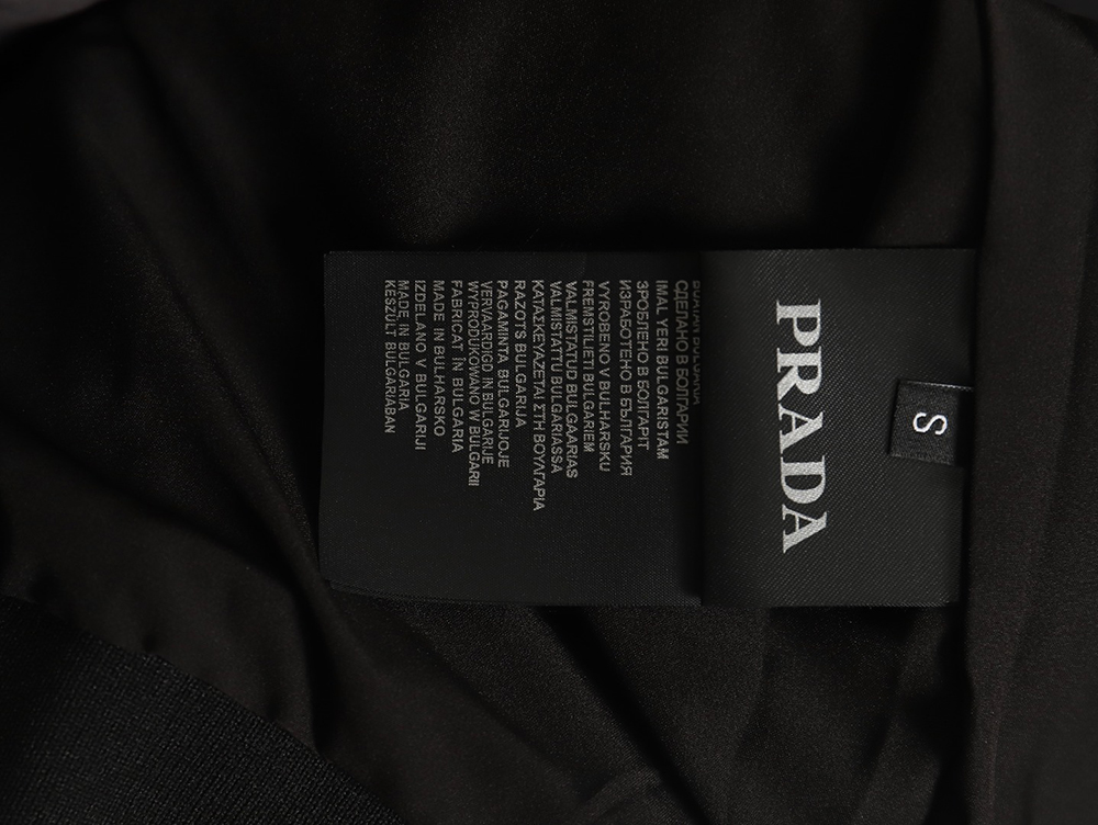 Pra*a triangle logo webbing woven zip-up jacket