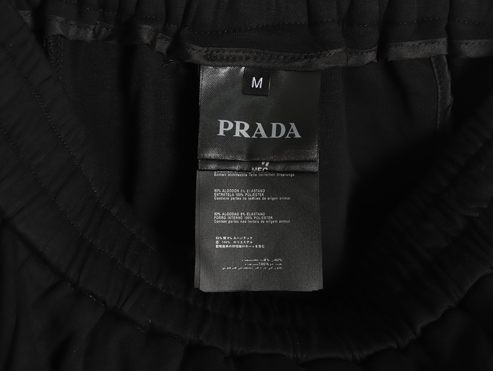 Pra*a triangle logo iron plate cotton cargo trousers