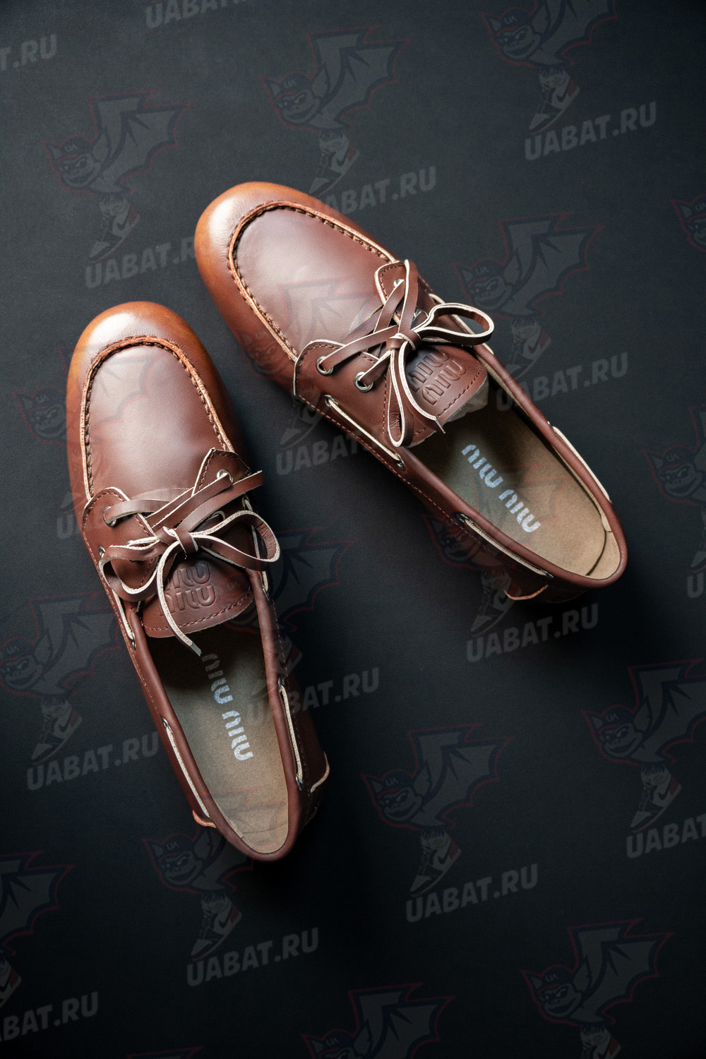 Miu Miu bleached leather loafers