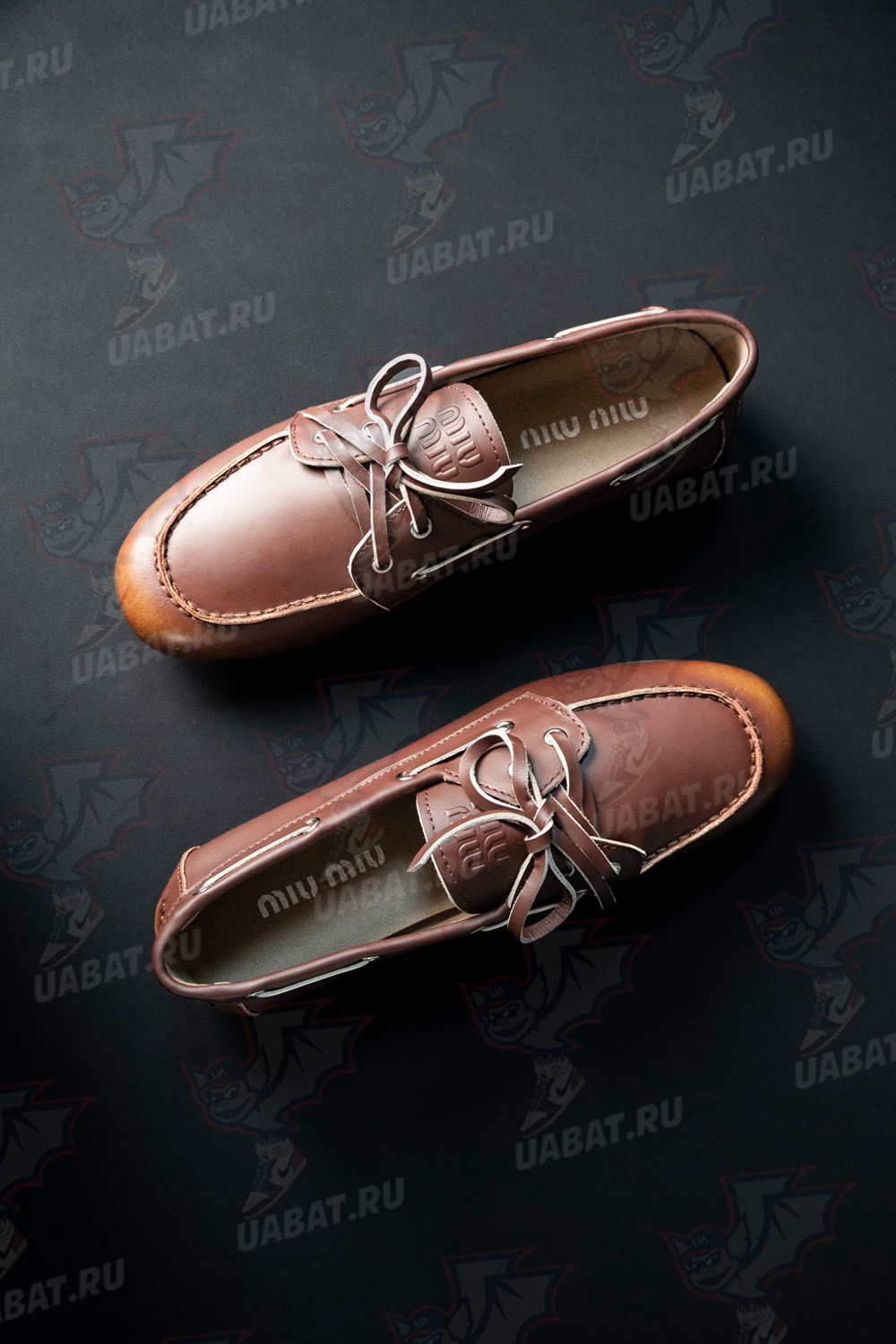 Miu Miu bleached leather loafers