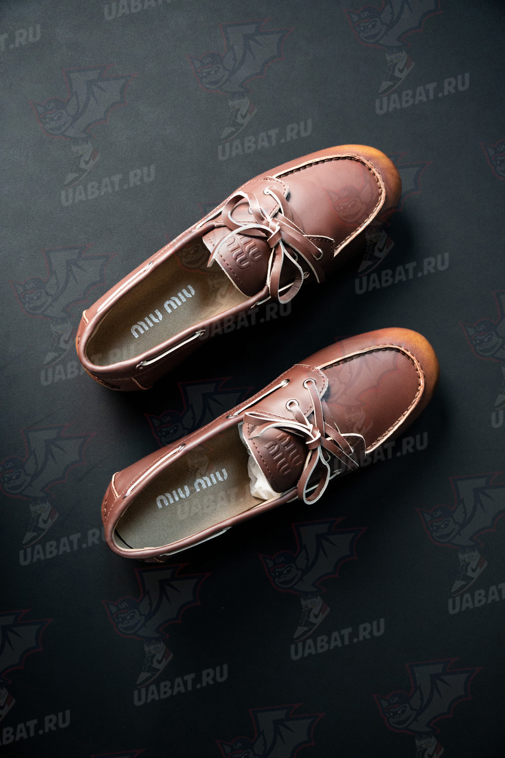 Miu Miu bleached leather loafers