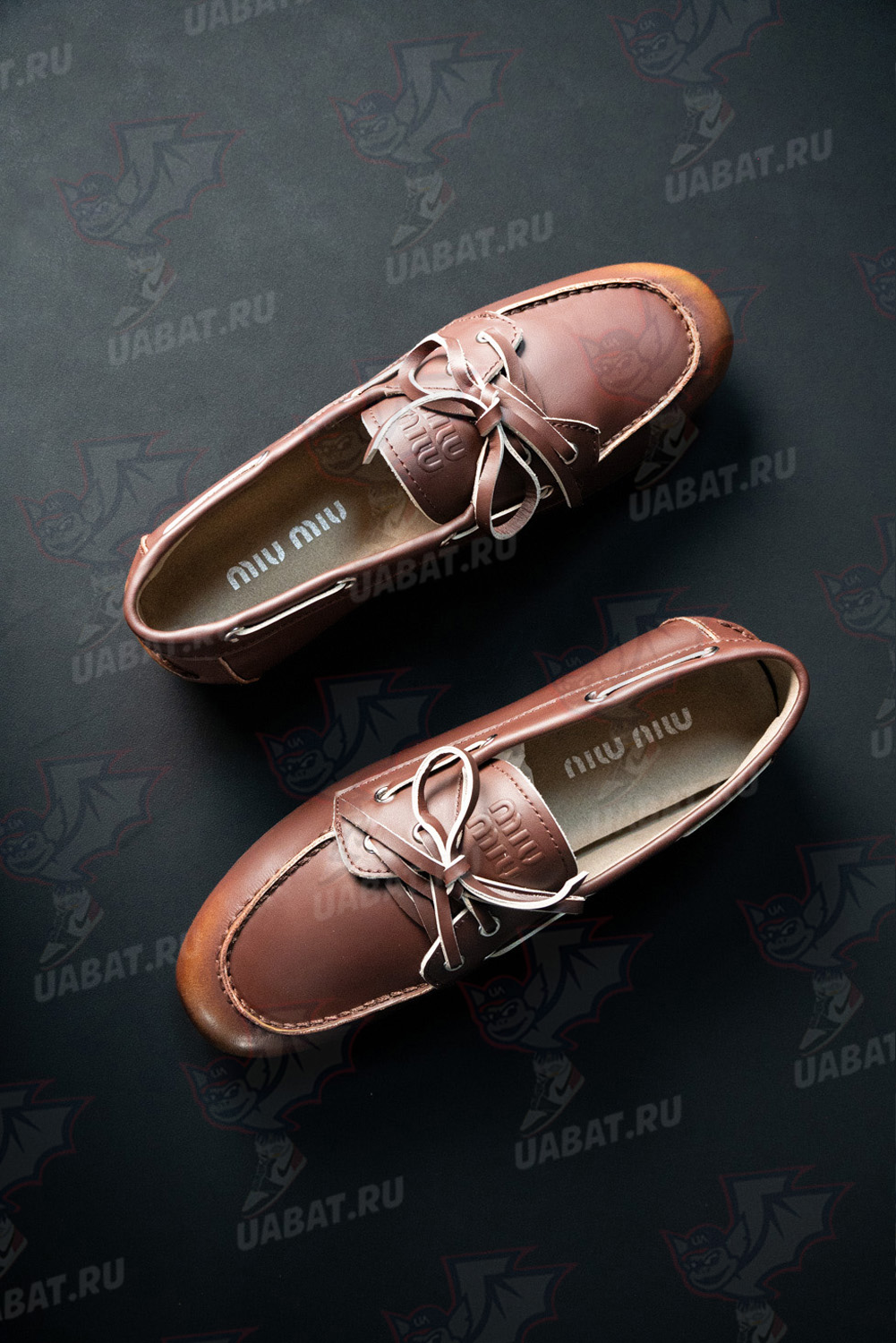 Miu Miu bleached leather loafers