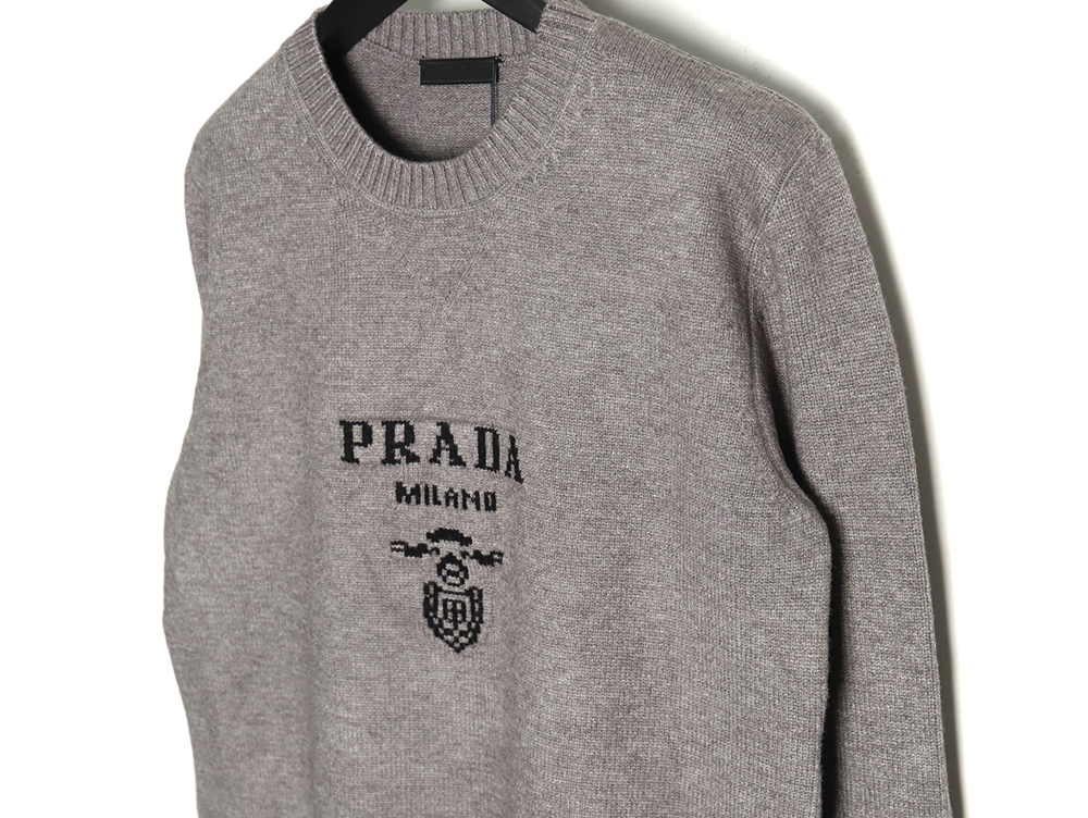 Pra*a sweater with floral logo on chest tsk1