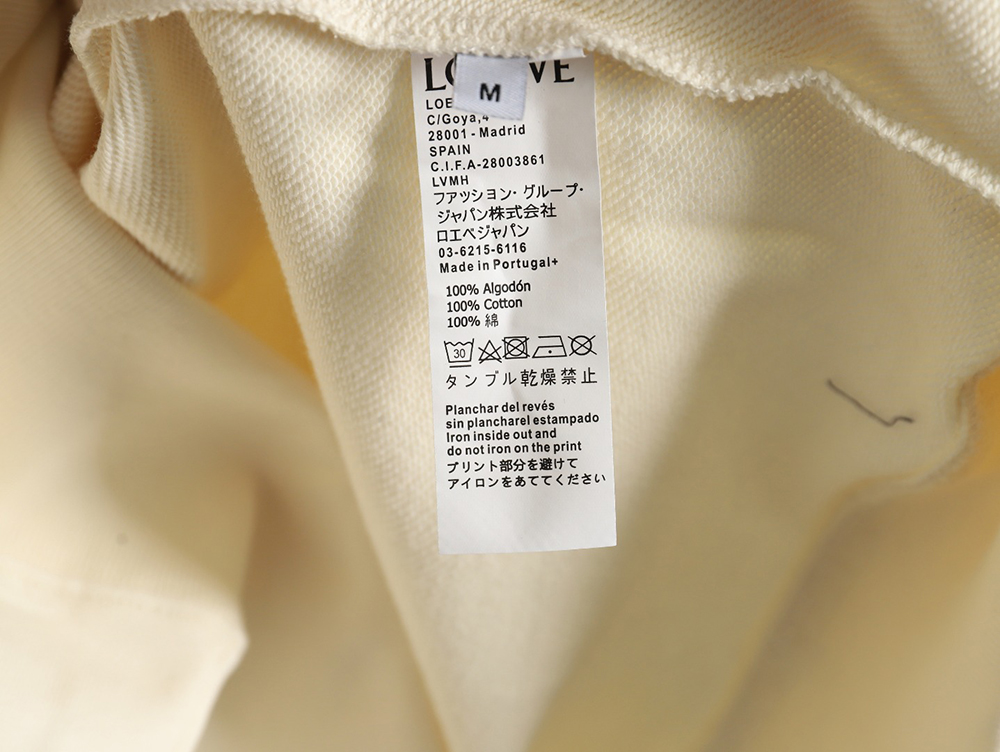 L0ew* hooded sweatshirt with embossed logo on chest and leather pockets