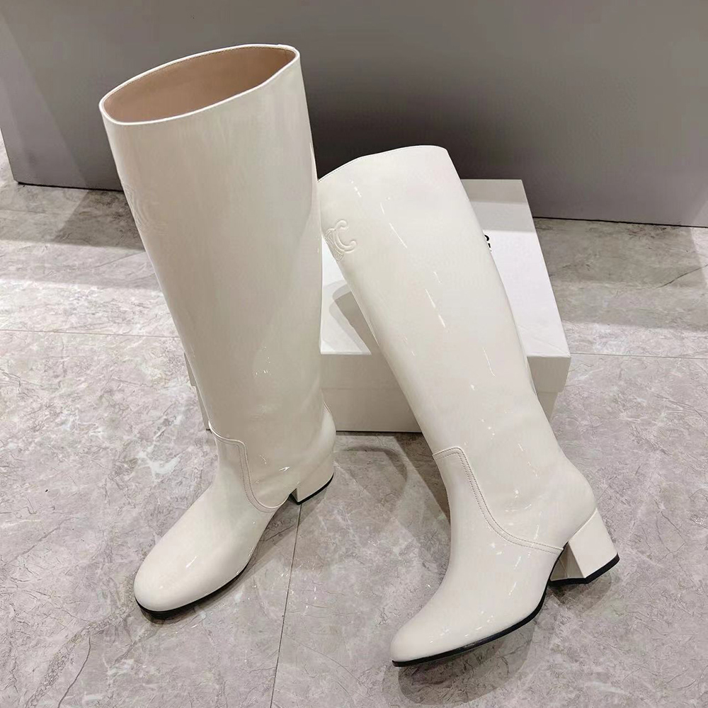 Ce**e triomphe high boot in patent calfskin